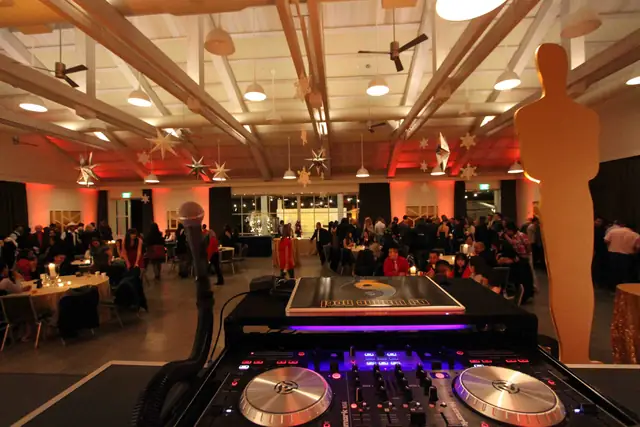 View from DJ Wayne Noel's decks over a full holiday party in the event hall at Solage, Calistoga