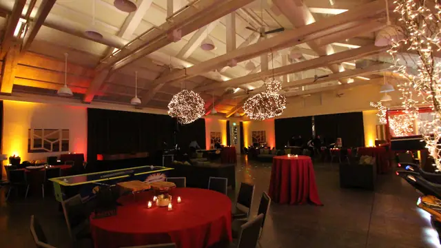 Candlelit tables and warm uplighting in the event hall at Solage, Calistoga